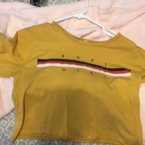 A crop top shirt that says baby girl